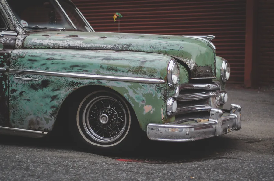 A Faded Green Sedan