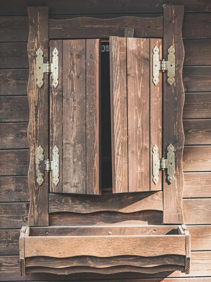 Shuttered Cabin Window