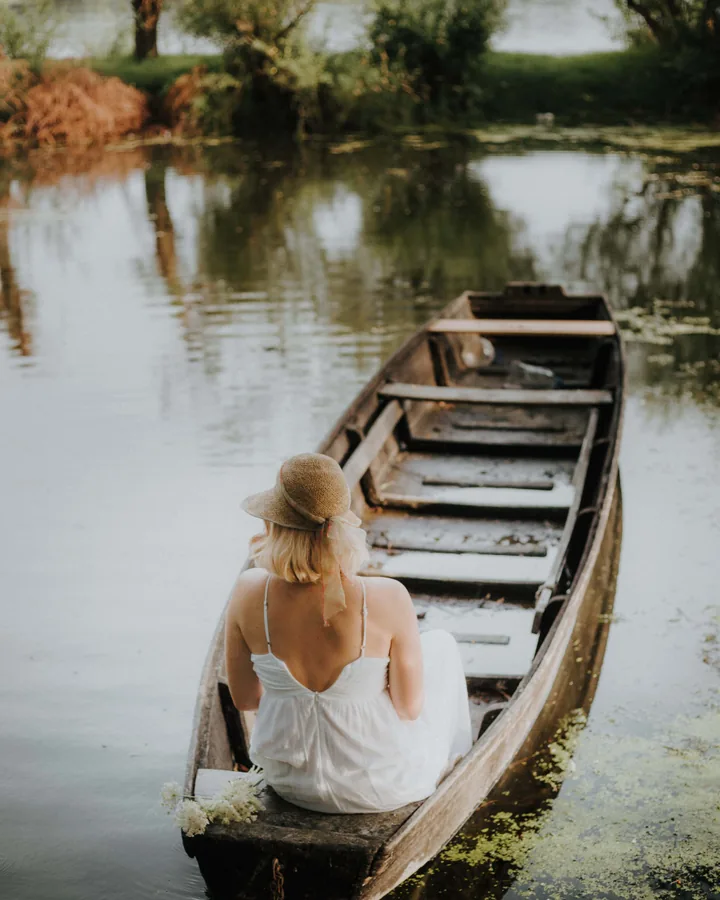 Girl in a Wooden Boat